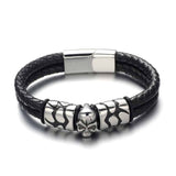Ce bracelet est composé d'un bracelet en cuir véritable noir résistant et d'une tête de mort en acier inoxydable.